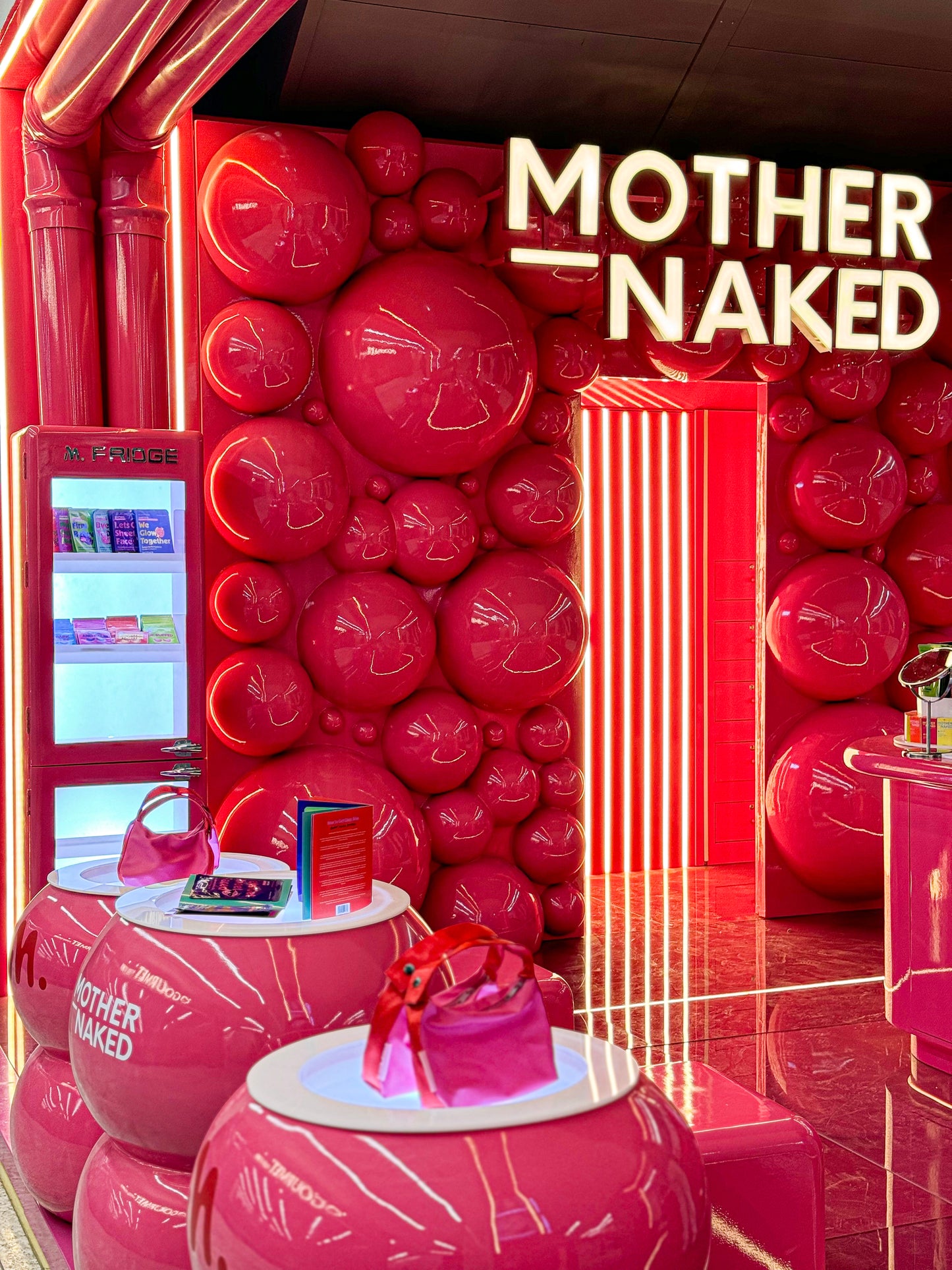 MOTHERNAKED BOOTH